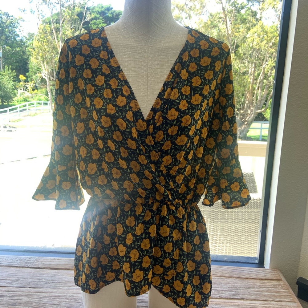 orange floral blouse